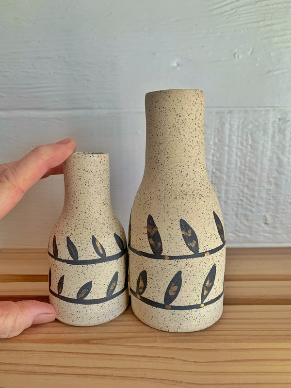 Two Stoneware and iron oxide leaves bottles