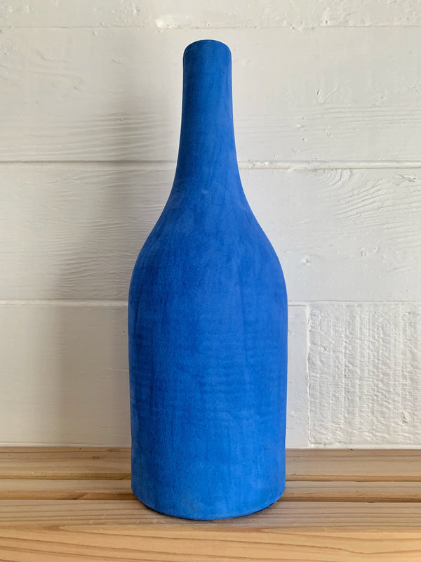 Large blue velvet bottle