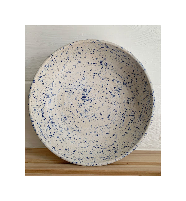 Blue speckled and matte white serving bowl