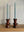 One tier short dark ketchup candle stick holders