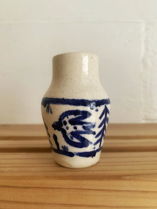 Tiny blue and white vase