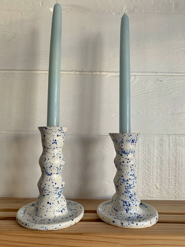 Blue and white spotted candle stick holders