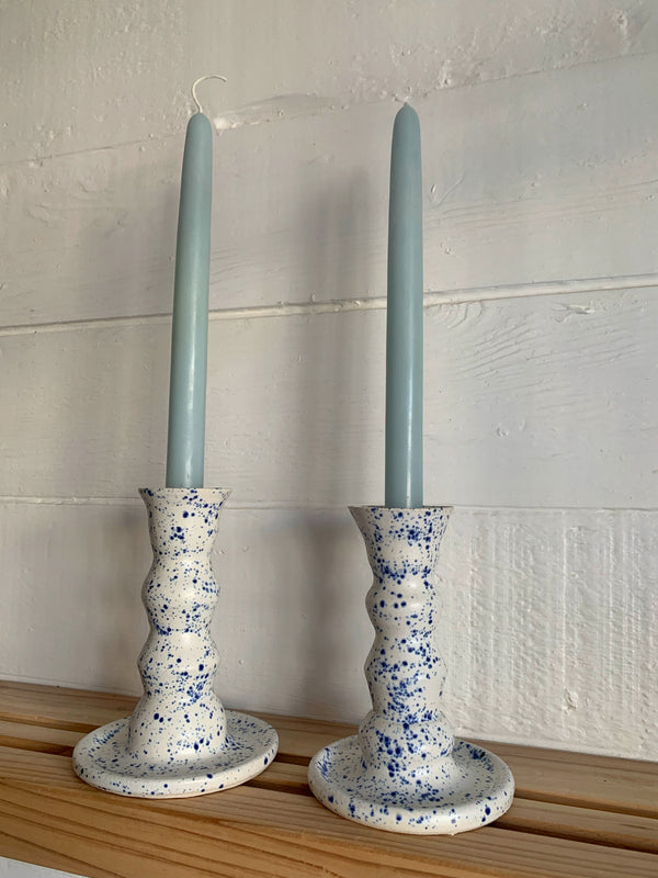 Blue and white spotted candle stick holders